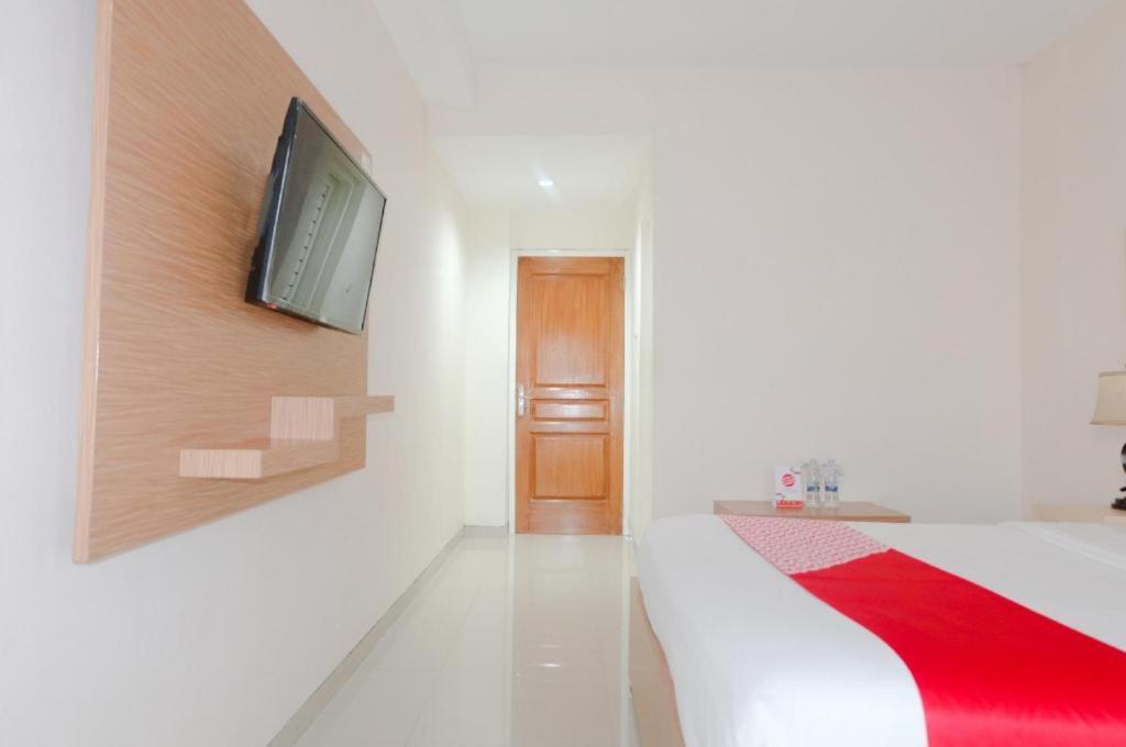 Oyo 696 Hasanah Guest House Syariah De Saphire Malang Dış mekan fotoğraf